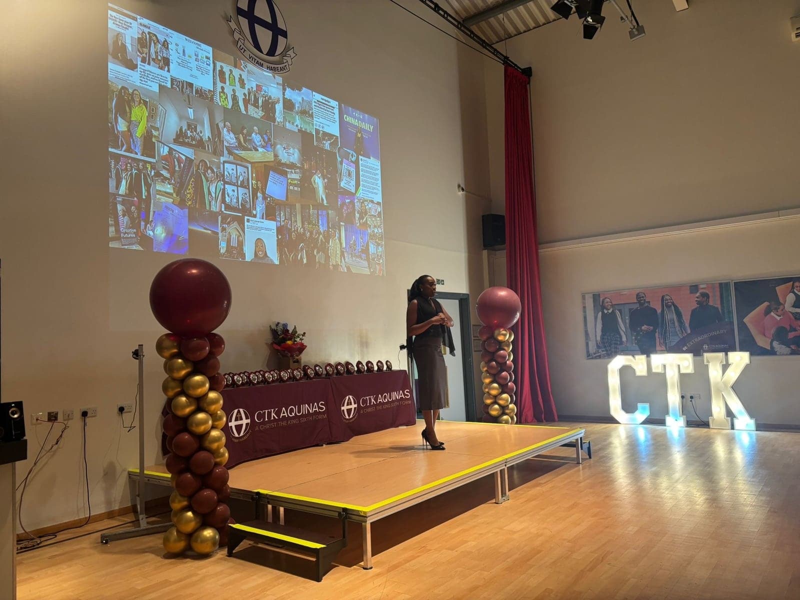 Sharon Adesola David addressing students at Christ the King Sixth Form College
